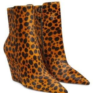 Stuart Weitzman 100 mm wedge (spotted cheetah calf hair) zip booties.
